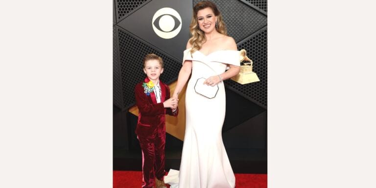 Kelly Clarkson brought the cutest date to the Grammys: her 7-year-old son Remington Kelly Clarkson poses on the Grammys red carpet with her son, Remi