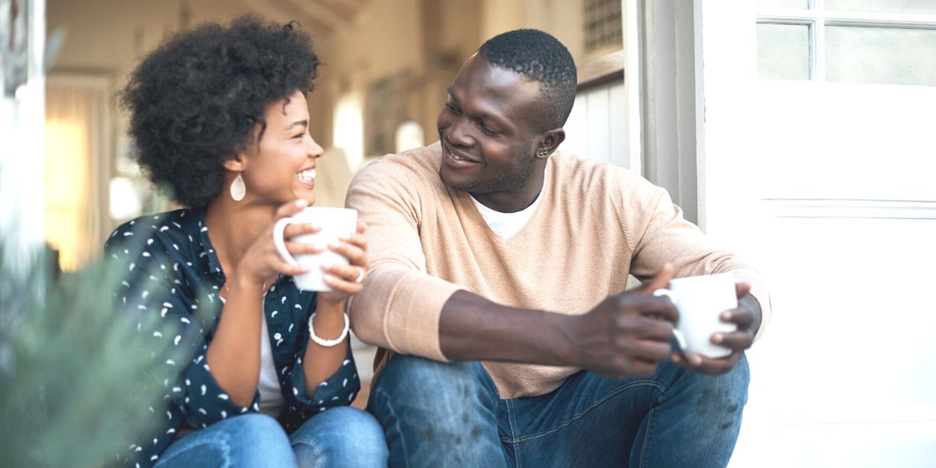 We love the concept of an ‘annual marriage meeting’—here’s why Married couple communicating