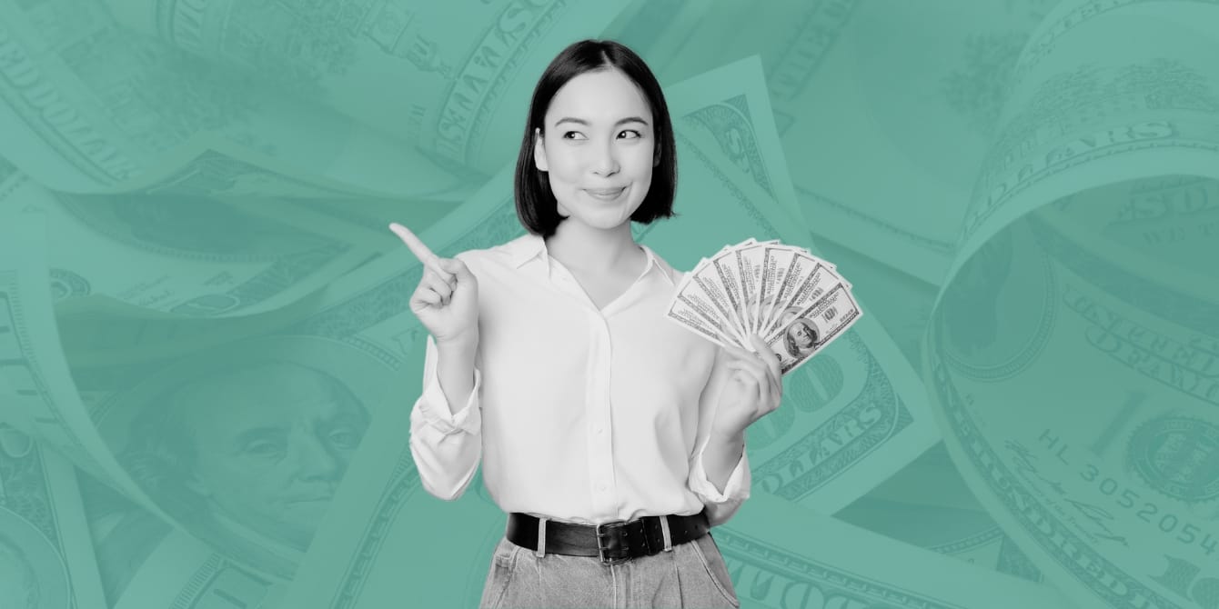 6 savings challenges: Lazy saving tips that every family should start right now woman holding money