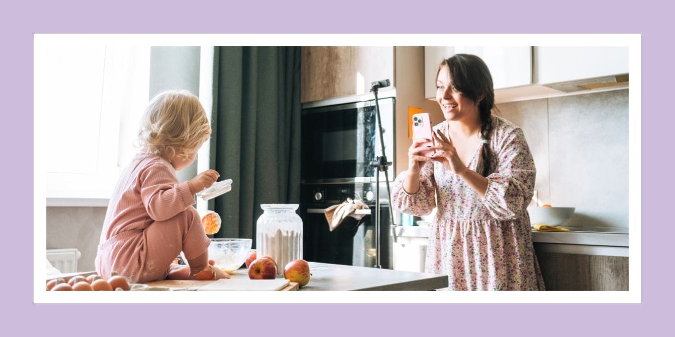 Momfluencers are negatively impacting new motherhood, new study shows Momfluencer taking a photo of her baby