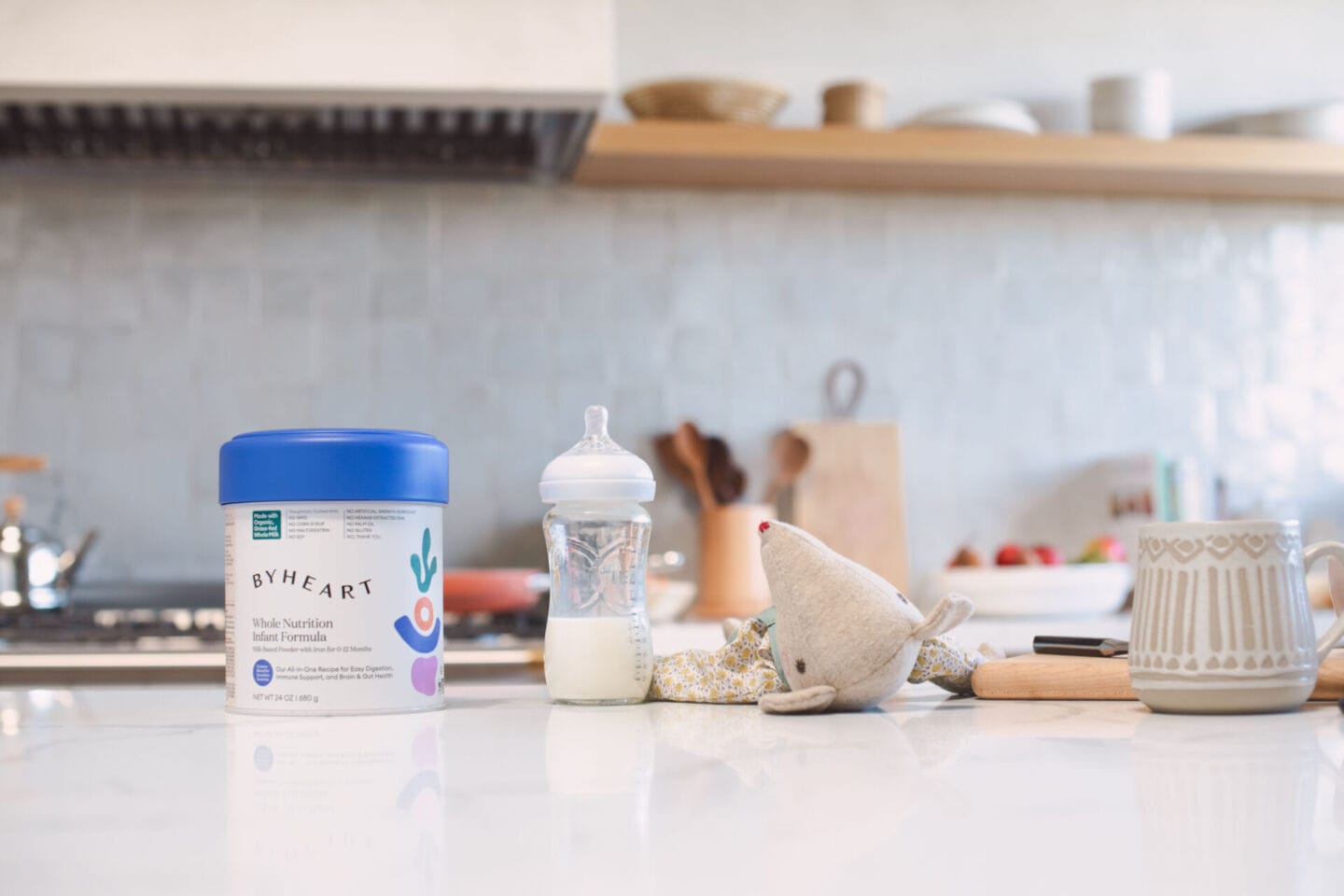 Byheart formula and bottle on kitchen counter