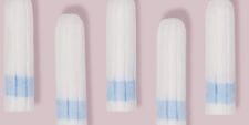Lead and arsenic may be lurking in your tampons, first-ever tampon study finds tampons on pink background - heavy metals in tampons study