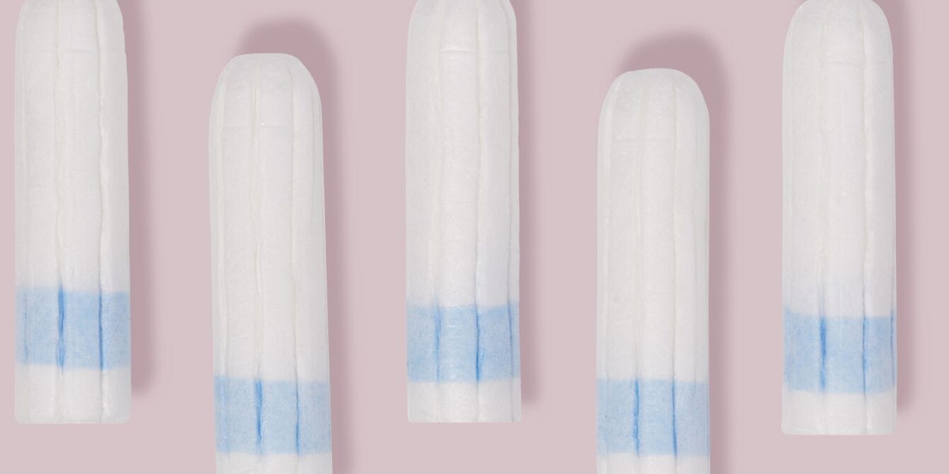 Lead and arsenic may be lurking in your tampons, first-ever tampon study finds tampons on pink background - heavy metals in tampons study
