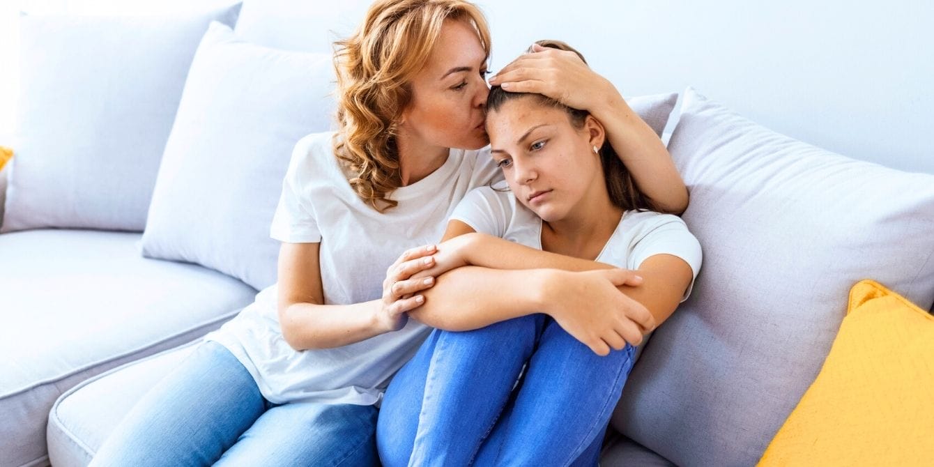 U.S. Surgeon General says 4 in 10 parents are ‘so stressed they cannot function’ Mother comforting her teen daughter