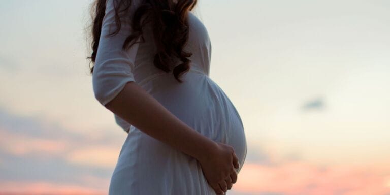Debunking 4 myths about egg health as you age pregnant woman at sunset - egg health myths
