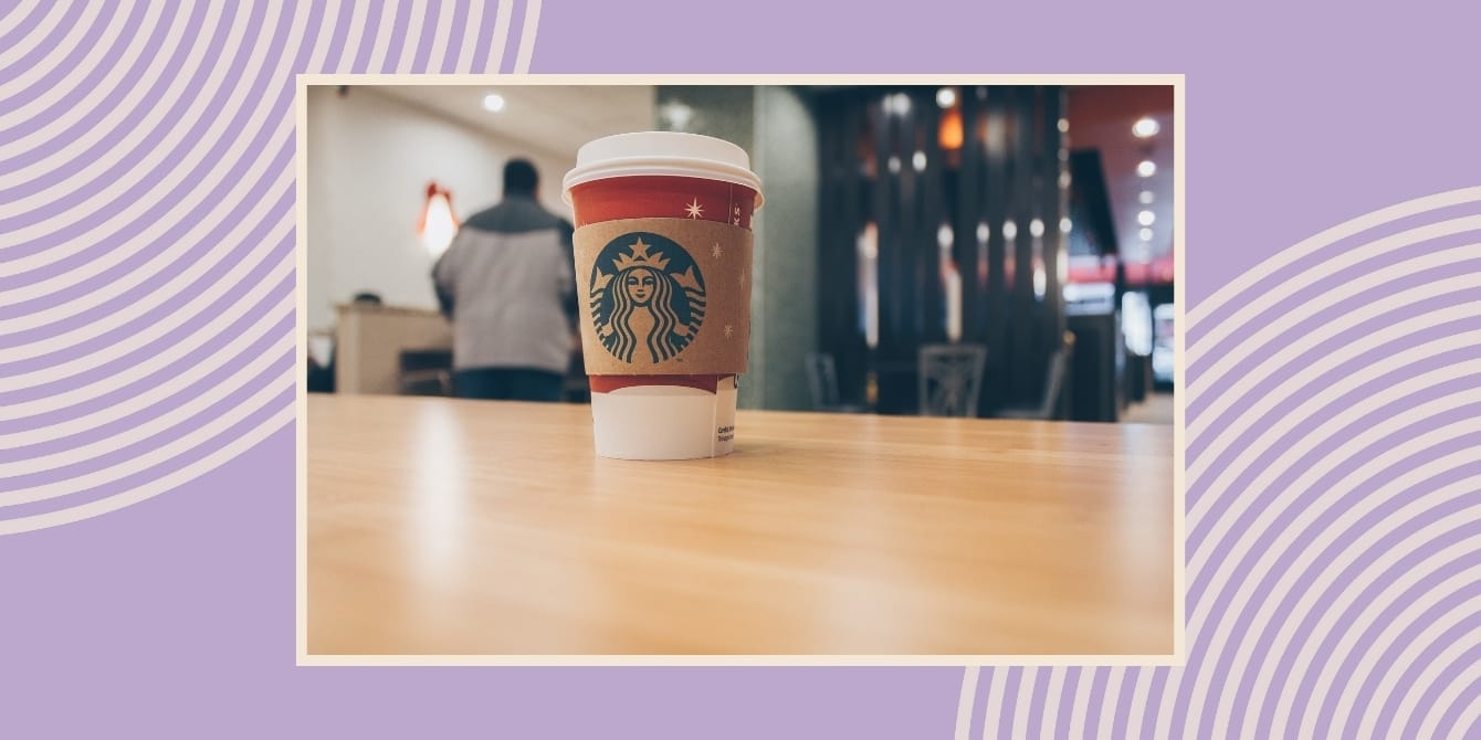 Starbucks doubles paid leave program—even for part-time baristas A Christmas Starbucks coffee cop on a table