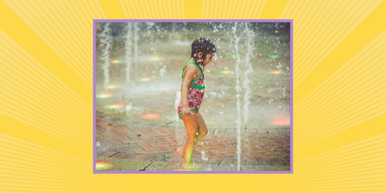 What parents should know about hidden risks at splash pads, according to a new CDC report Kid playing on a splash pad
