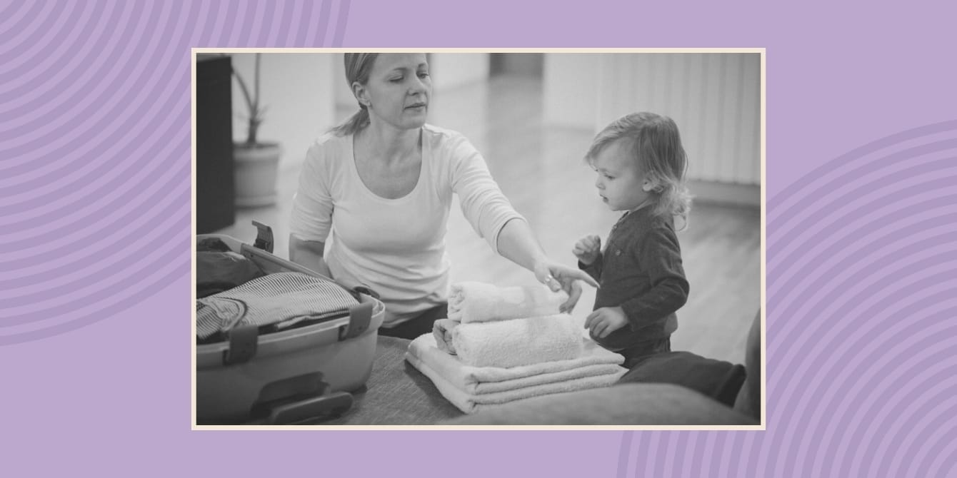 Mom moves her family for career, in-laws explode—call her ‘selfish for taking their grandchild away’ Reddit AITA: An image of a mom packing a bag with her child