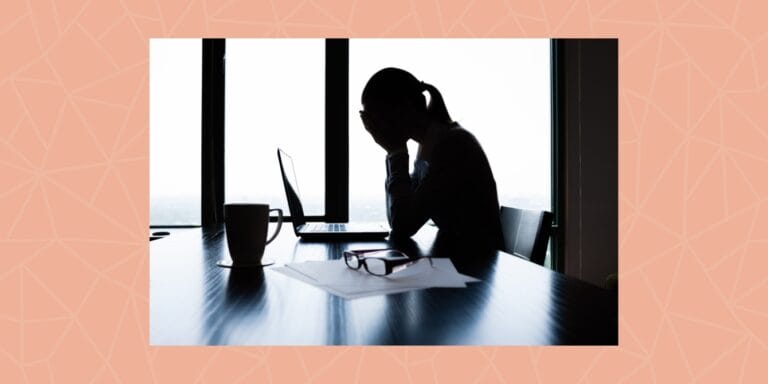 Why return-to-office mandates could set working moms back for decades Return to office mandates: A stressed woman sitting in front of a laptop