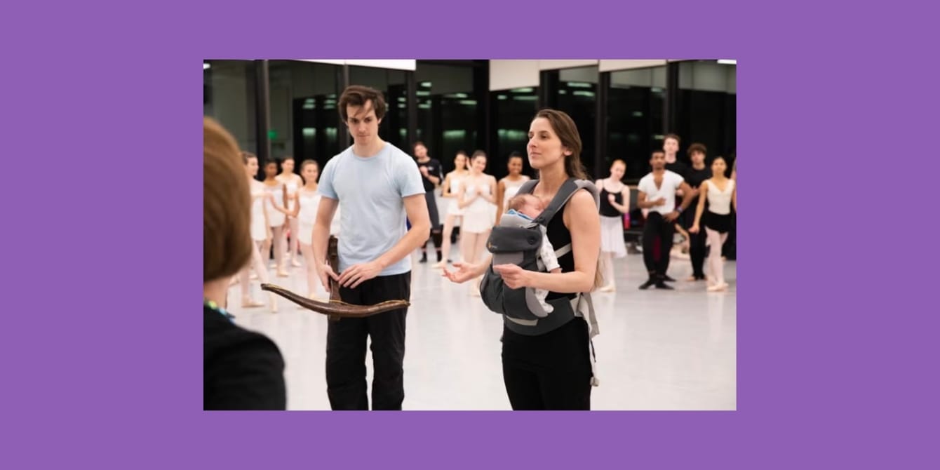 a group of people in a dance studio