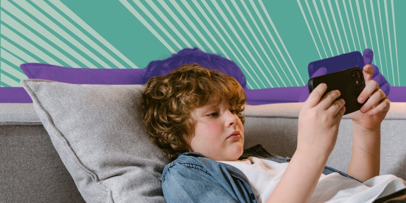10 tech-safety tips every family should follow this winter Kid laying on couch and scrolling on his smartphone