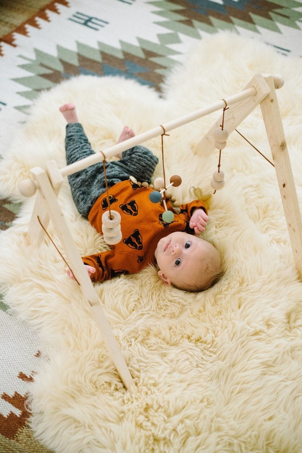 bohemian minimalist baby nursery 4 - Motherly