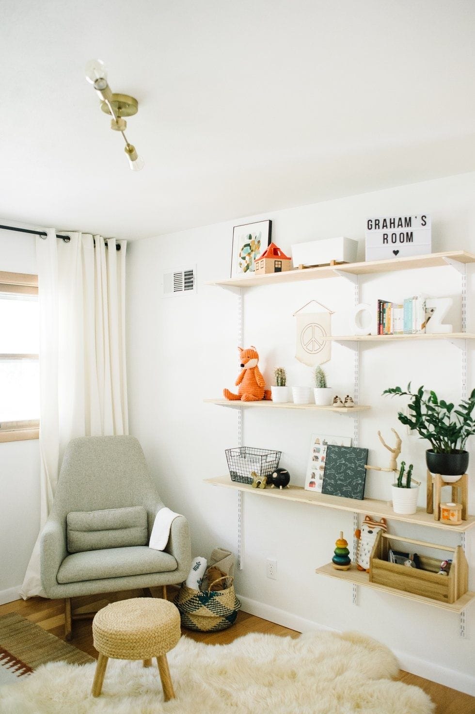 bohemian minimalist baby nursery 5 - Motherly