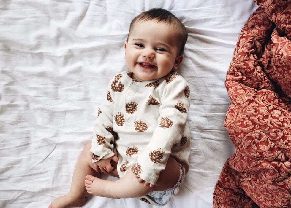 keep cool carry on what mamas need to know about baby fevers 0 - Motherly
