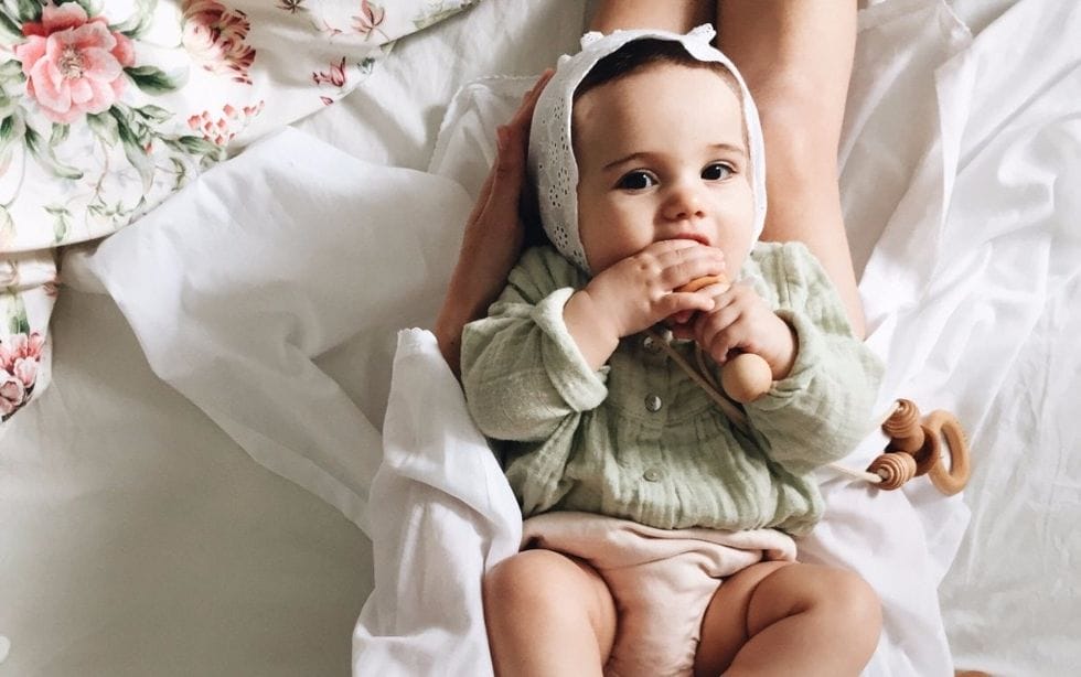 keep cool carry on what mamas need to know about baby fevers 1 - Motherly