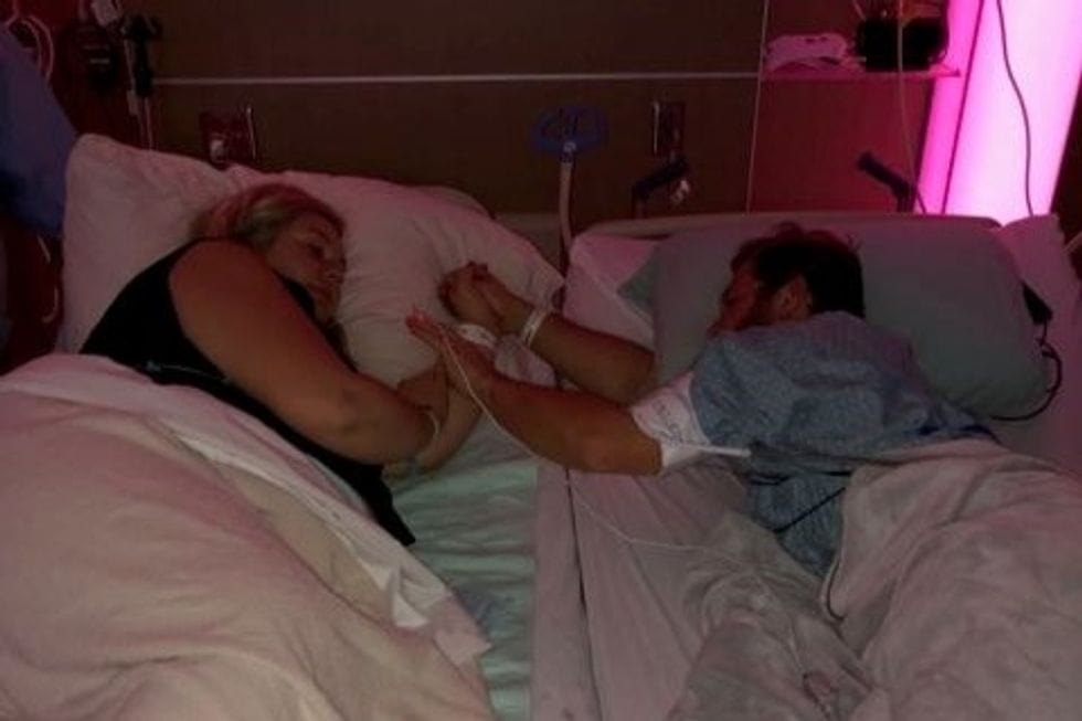 pregnant mama performs cpr on husband before giving birth 0 - Motherly